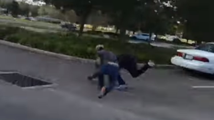 Body camera video shows off-duty deputy help officer arrest man shown running from Ocala police