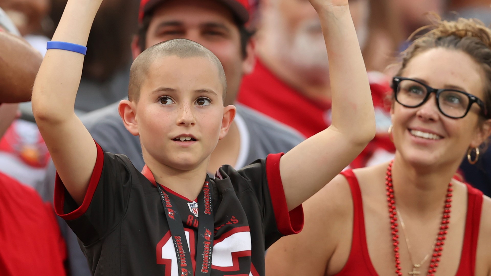 During Sunday's huge win over the Chicago Bears, a young Buccaneers fan stole the hearts of many with a sign in the stands.