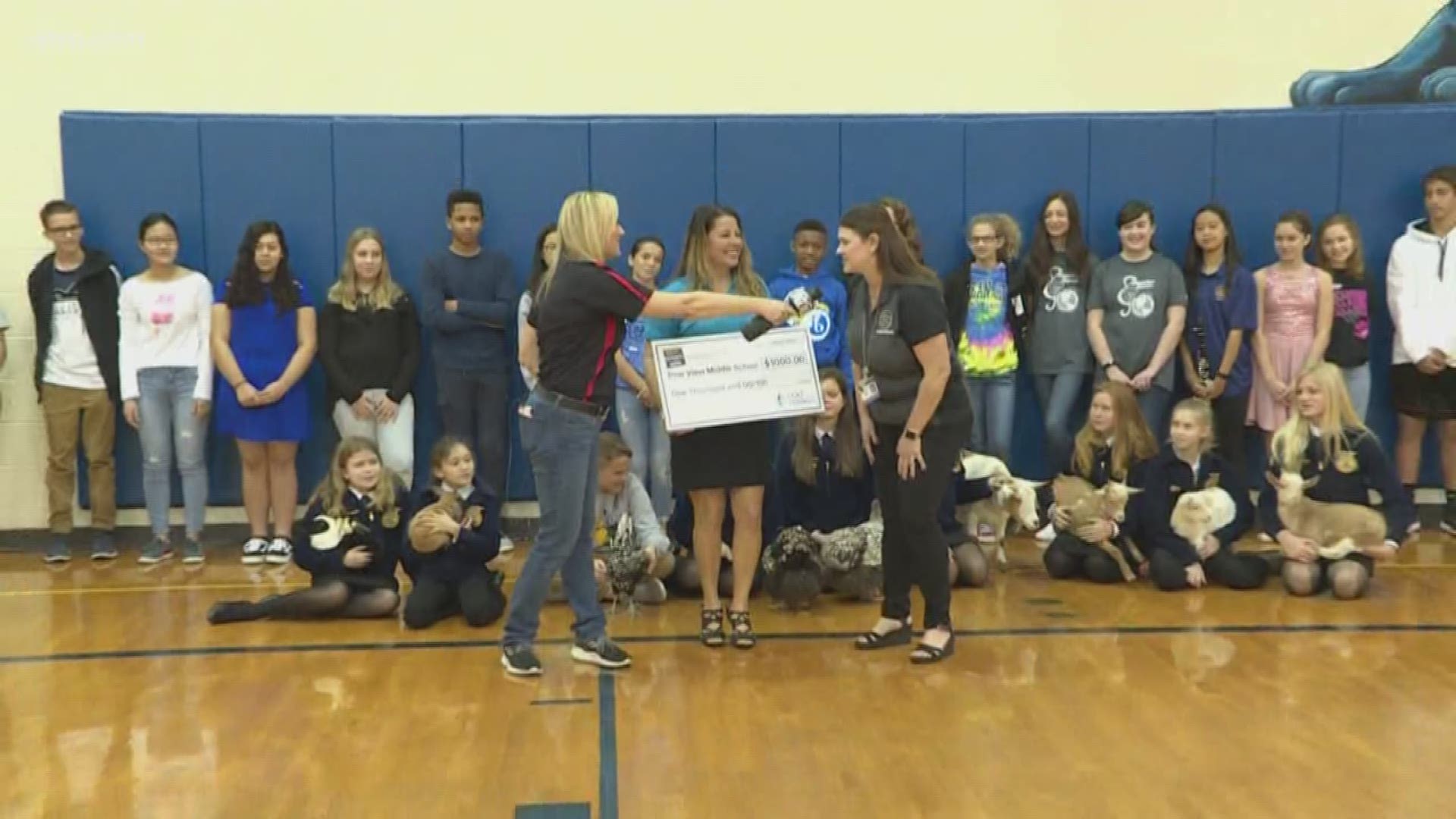 Duke Energy Florida presented a $1,000 check to Pine View Middle School.