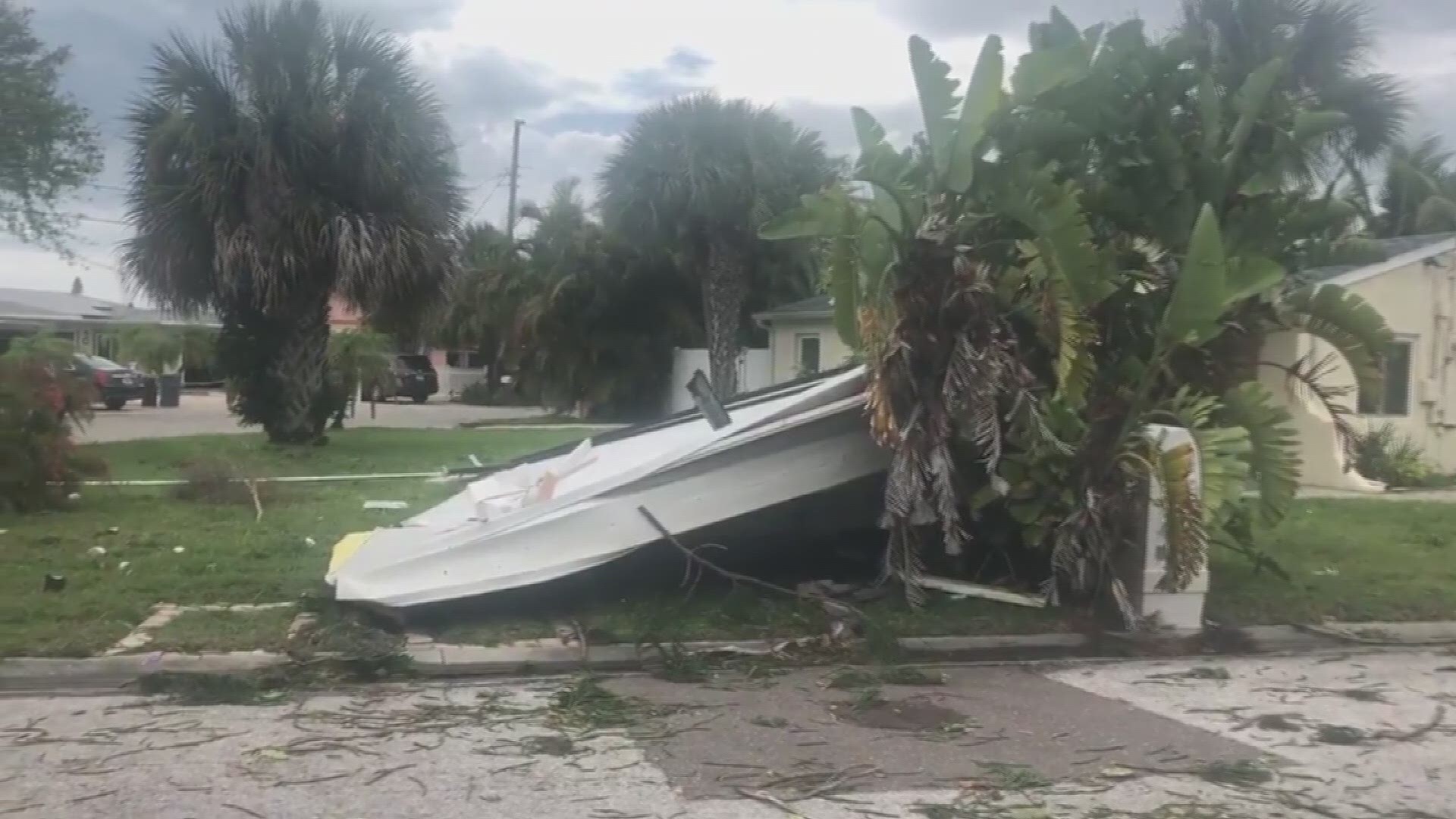 A possible waterspout moved ashore Sunday, May 5, at Madeira Beach and tore a back porch off a house and carried it into another neighbor’s yard. The damage to this neighborhood is obvious, with branches and power lines down.