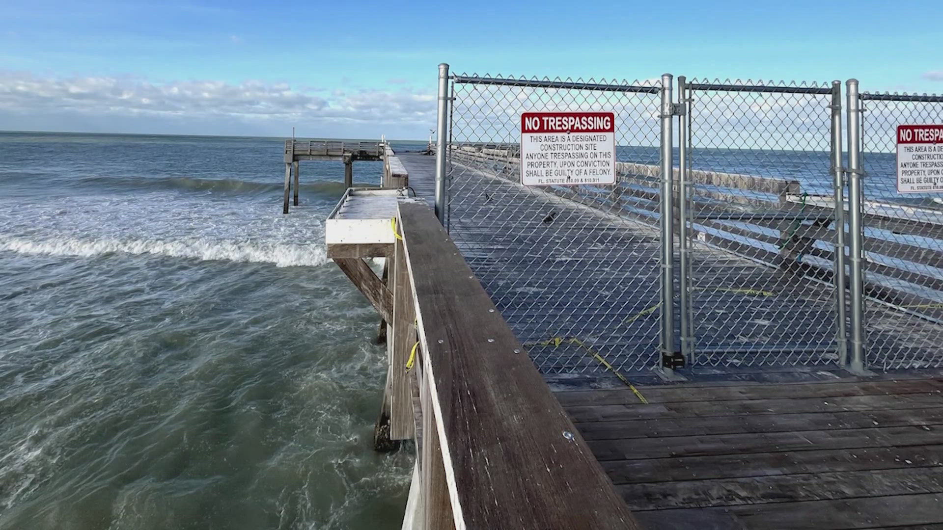 The city of Venice says a temporary fence will stop people from going farther out on the power than allowed.