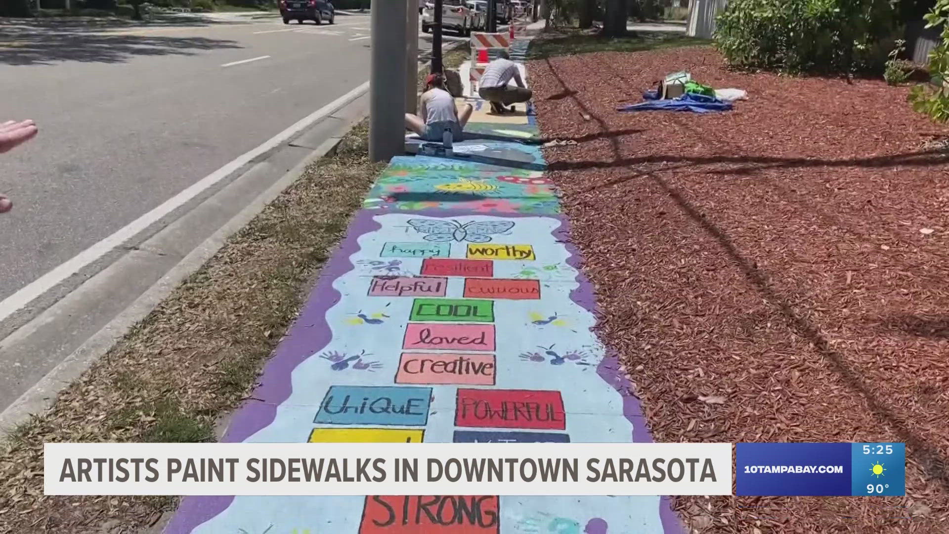 More than 200 artists from 12 different countries are painting sidewalk panels in the Burns historic district downtown.
