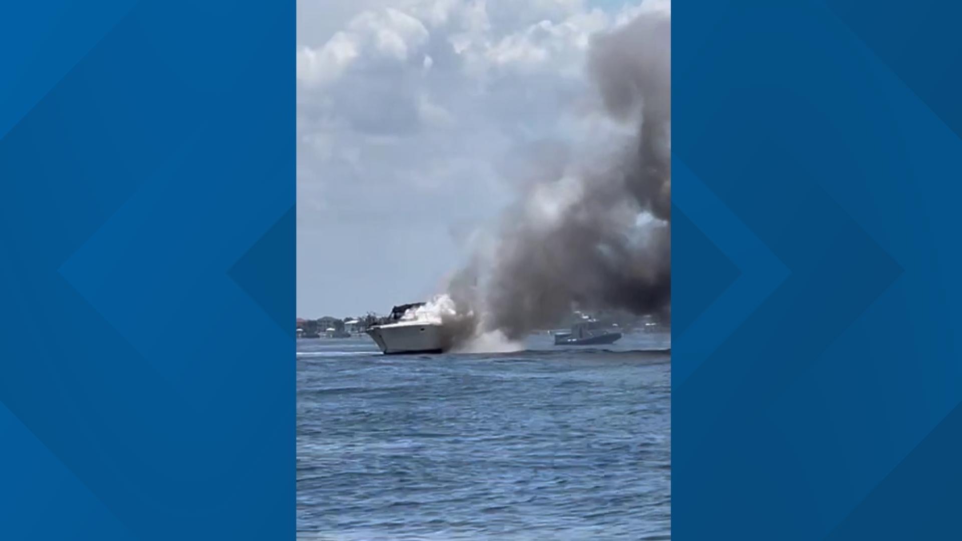 Video shows a boat fire happening Saturday afternoon near popular hangout spot Beer Can Island.