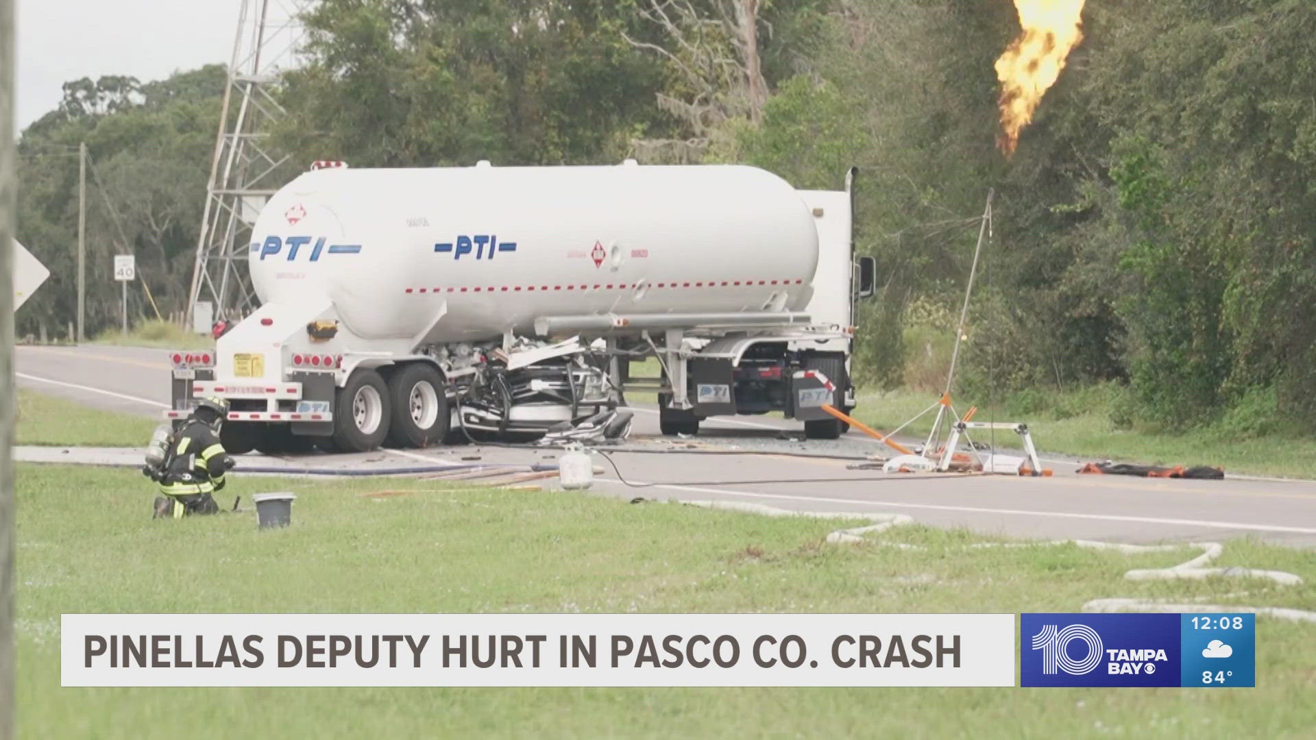 The deputy's marked SUV collided with and got wedged under the tanker's trailer.