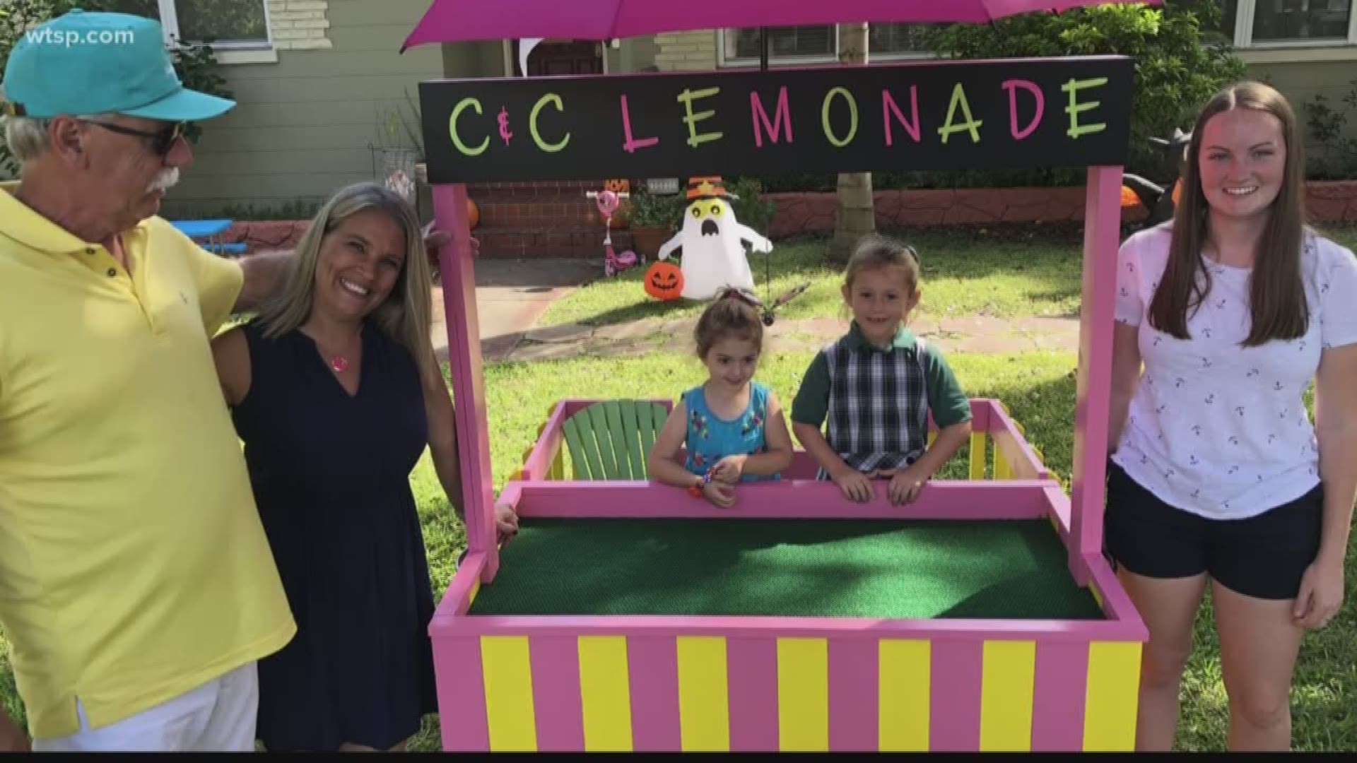 Michelle Fetz and John Schwier drove over an hour to deliver a pink and yellow lemonade stand to Caroline Gallagher.  https://bit.ly/2Bg9HU0