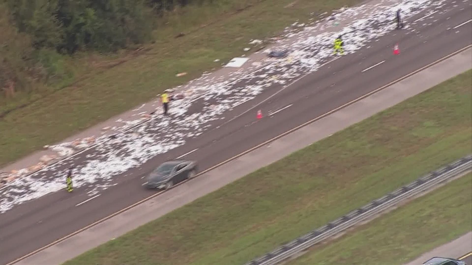 Debris scatters a portion of I-75 after an accident Monday morning near Big Bend Road.