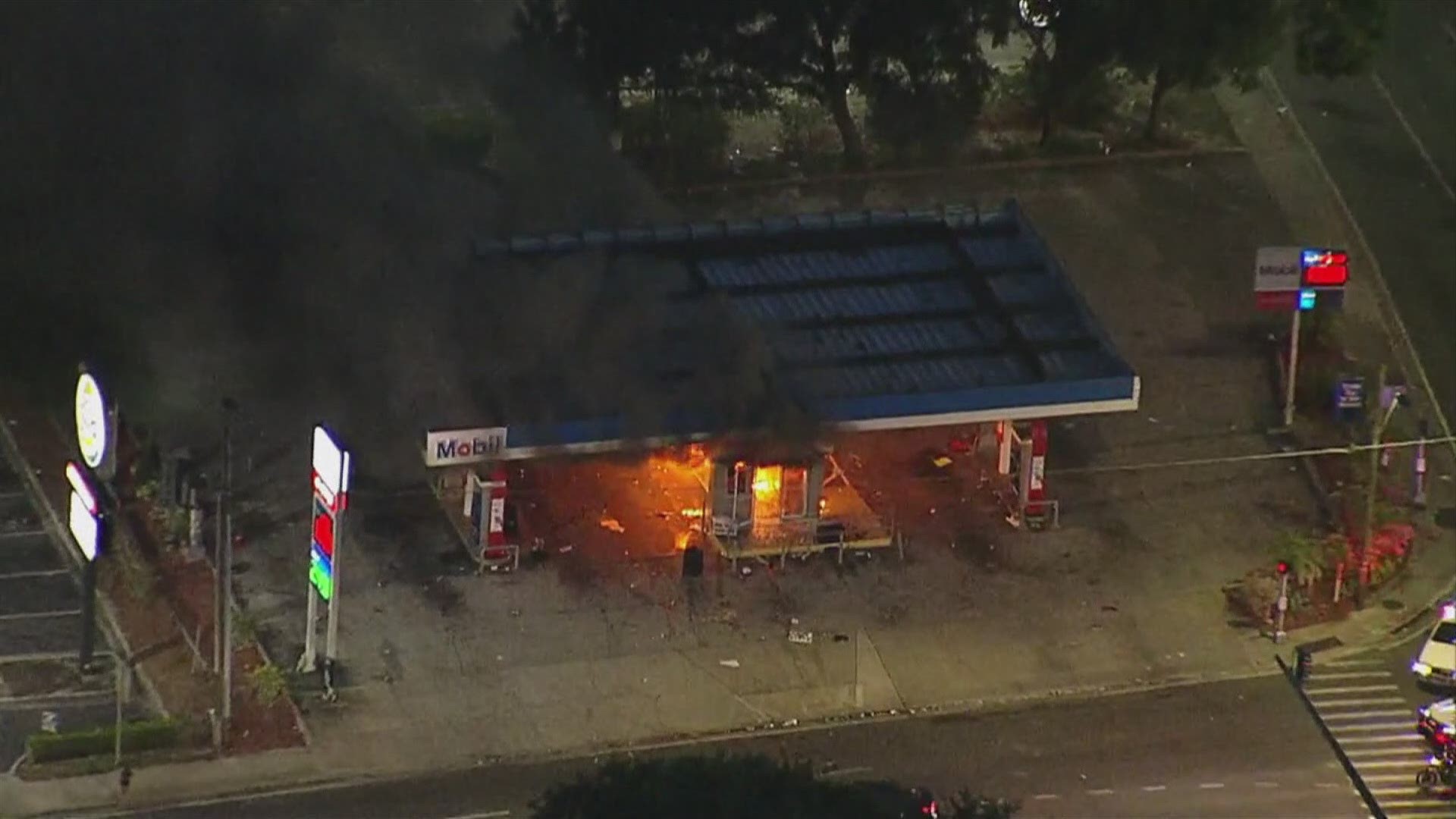 Tampa firefighters were called to the Mobil gas station at N. 30th Street and E. Busch Boulevard where a fire broke out, engulfing the entire building.