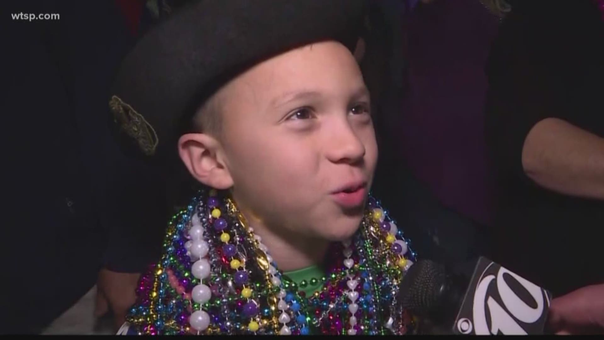 One child says the secret to getting more beads is trying to be cute.