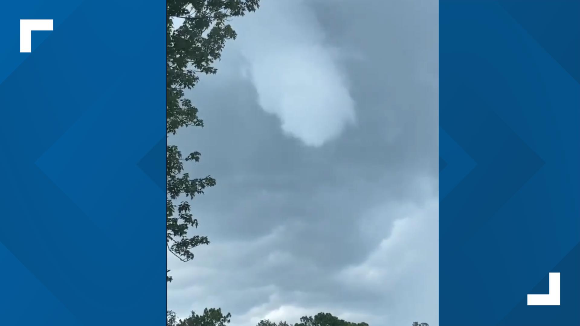 Resident Adrianna Campbell took video of a funnel cloud forming over her in Spring Hill.