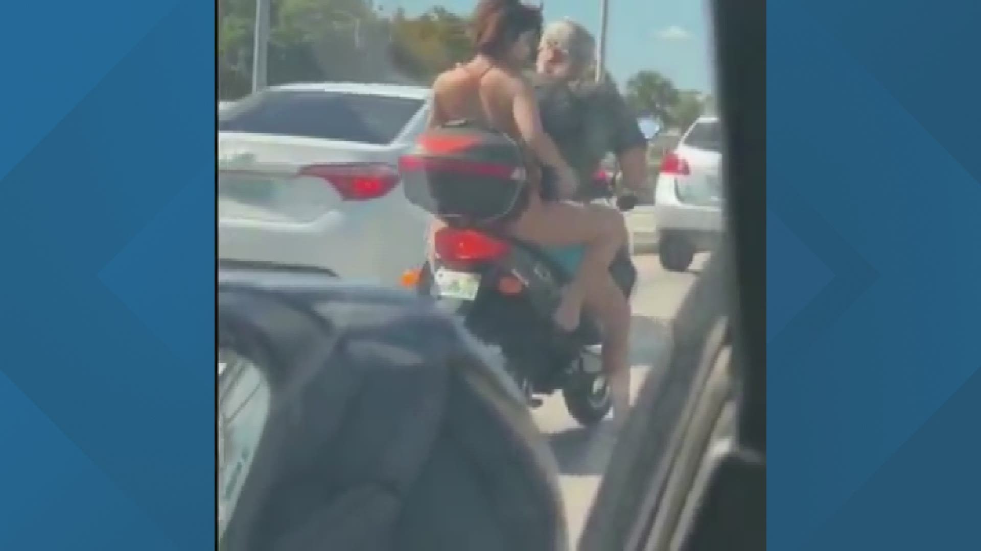 Woman captured on video shaving her legs on the back of a motorcycle.