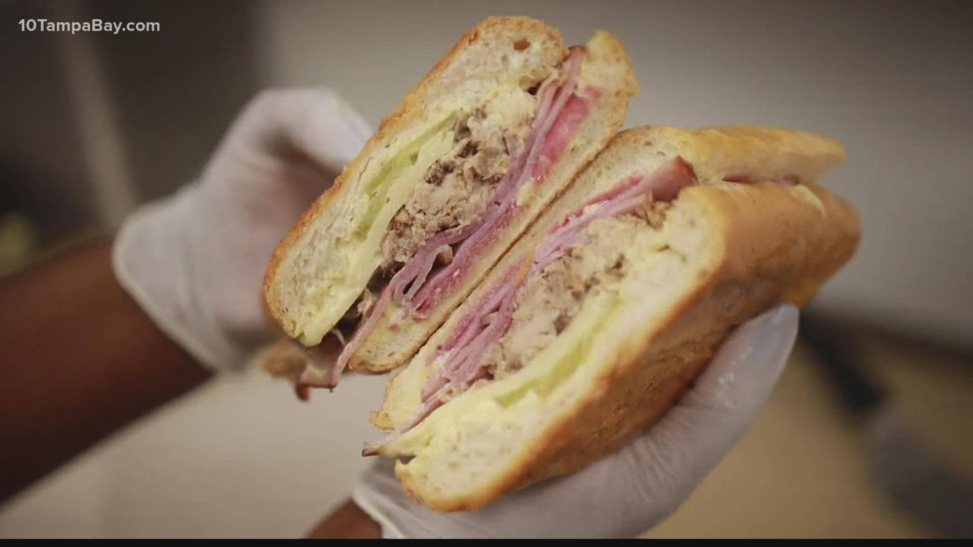 La Segunda says traditional Cuban sandwiches are made with meat, cheese, sauce, pickles, and pressed with butter.