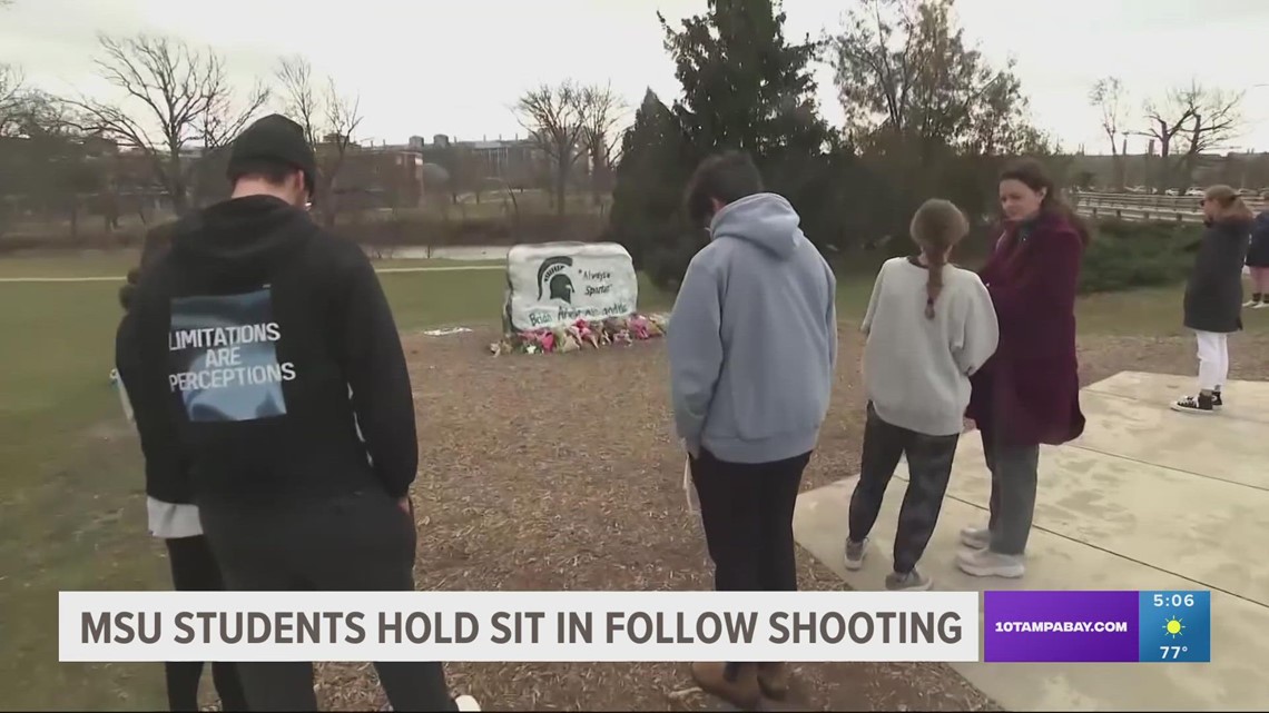 Michigan State University students hold sit in outside state capitol