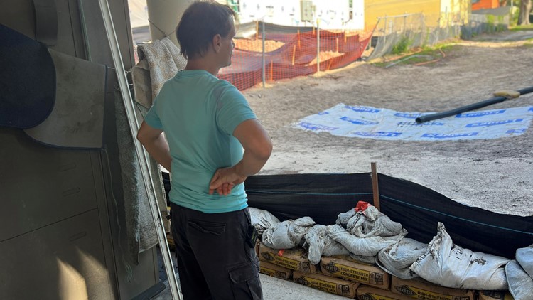 'We panic every time it rains': Lakeland condo owners frustrated after rain, sand flood homes