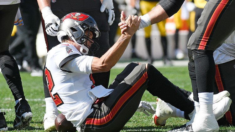 Boy tackled by security after running on field at Bucs game