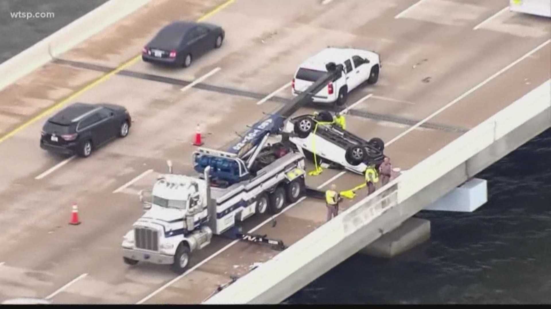 Dive teams called off the search Wednesday afternoon for the driver of the white SUV that went off the Howard Frankland Bridge during a morning crash. 

The dive teams called off the search as of 3 p.m. and said the water is between 18 to 20 feet deep with low visibility.