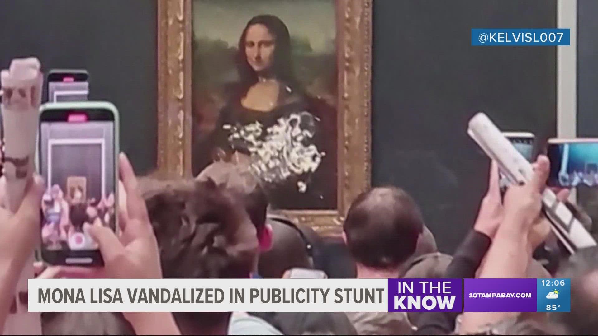 Watch: Man disguised as 'old woman' attacks Mona Lisa with cake