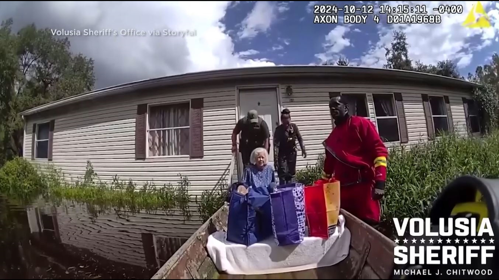 Footage shared by the Volusia County Sheriff’s Office shows deputies wading through floodwaters brought by Milton to reach an elderly woman’s home.