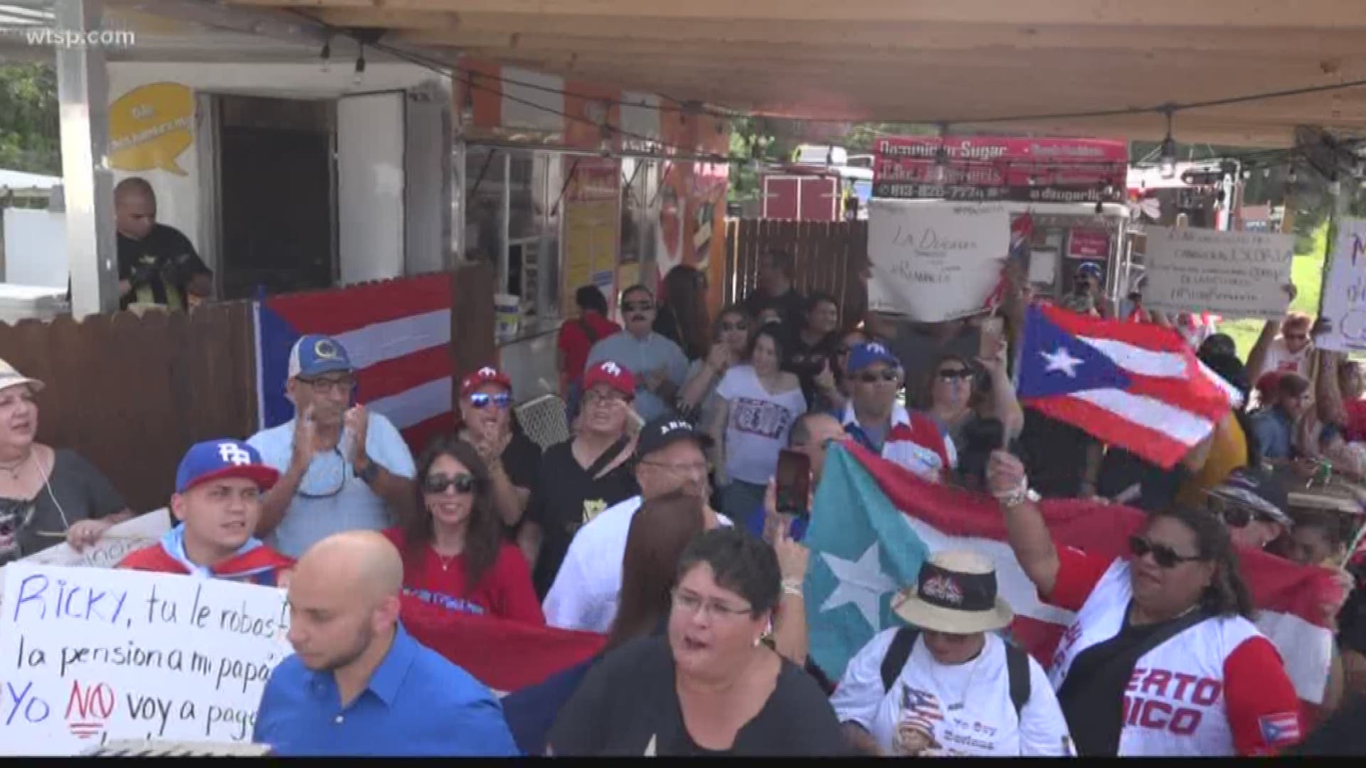 Protests in Puerto Rico raged on into the seventh day, and on Friday hundreds of locals gathered at Tampa restaurant La Fritanga de Tonita to support Puerto Ricans and demand its governor, Ricky Rossello, step down immediately.

This all started on Saturday after the publication of hundreds of pages of chats among the governor and his officials.