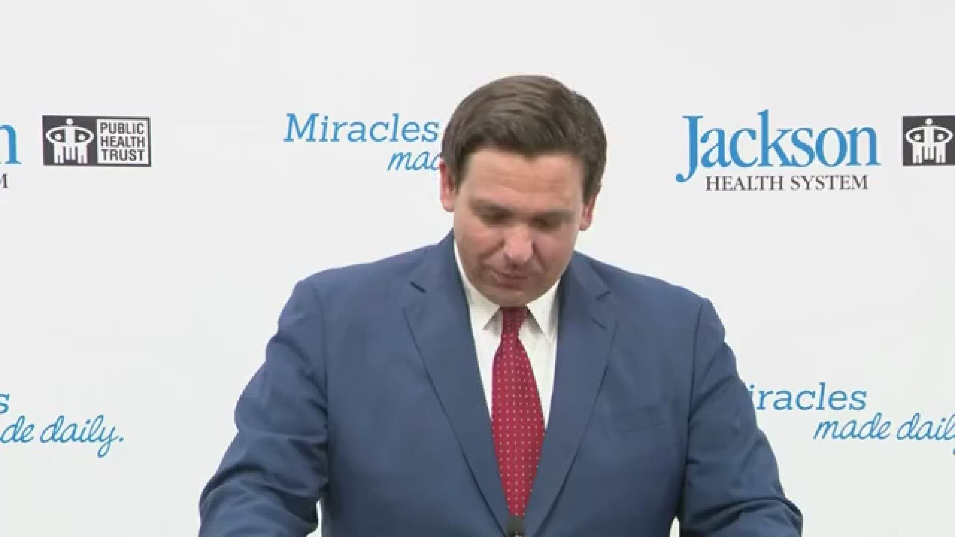 As Florida Gov. Ron DeSantis began his COVID-19 update, an unidentified man shouted over the governor as he tried to talk