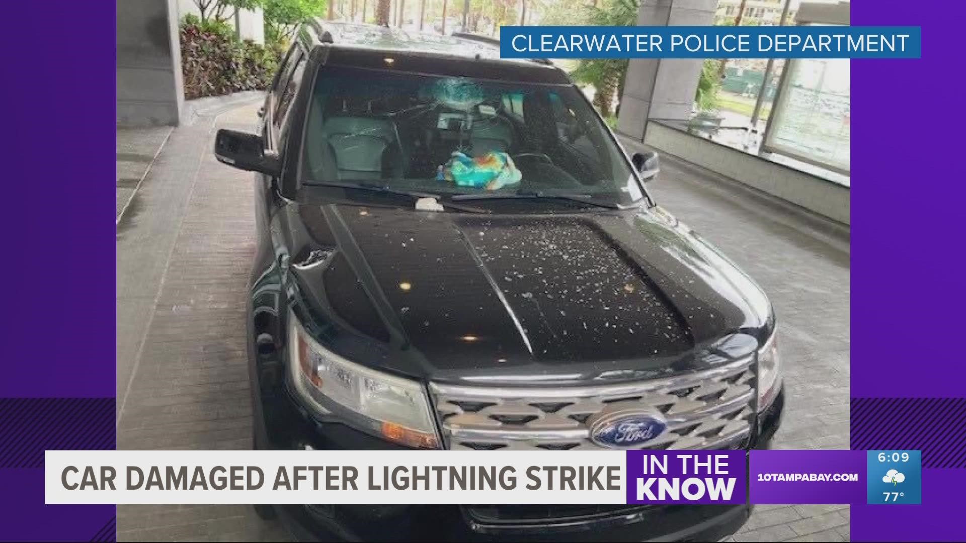 The roof of the Opal Sands Resort was struck by a lightning bolt, sending debris into the parking lot below.
