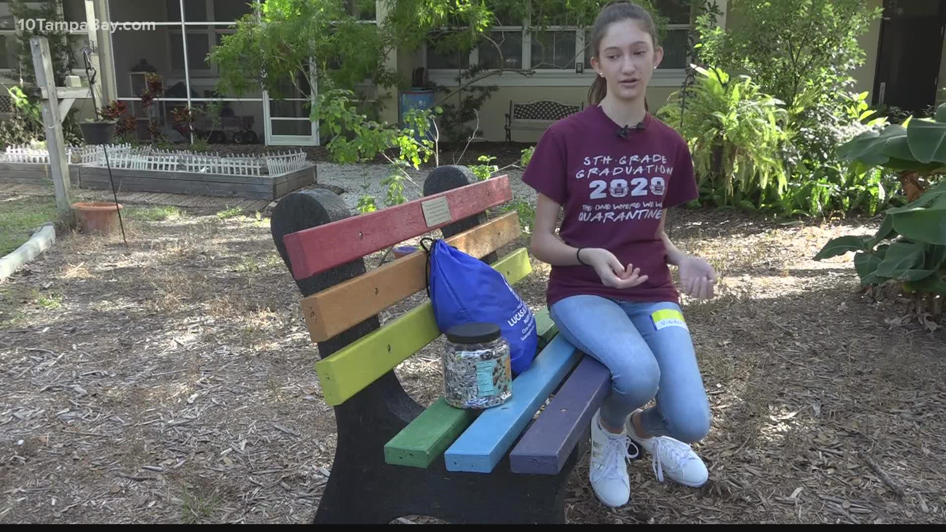 Marissa Acotto created a bench made from recycled plastic bottle caps. The COVID-19 pandemic delayed the project for two years.