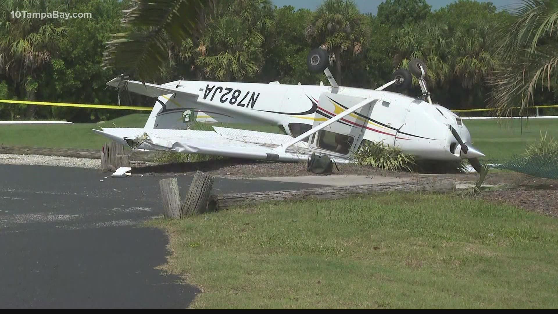 The plane's pilot and passenger were not hurt, an official said.