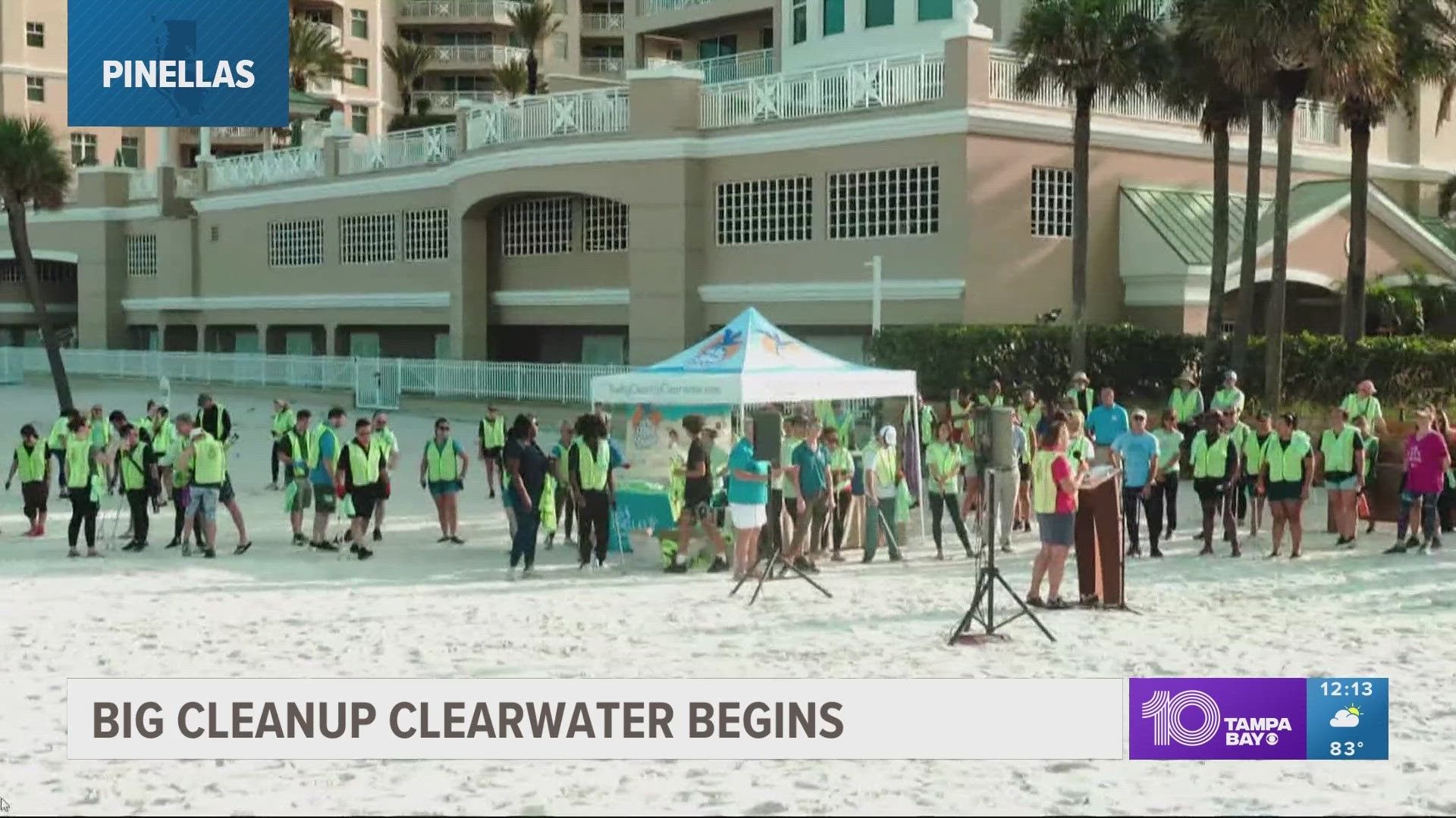 Families lined up at Clearwater Beach for the opening activities of efforts to clean up Clearwater after severe weather and tornadoes caused extensive damage.