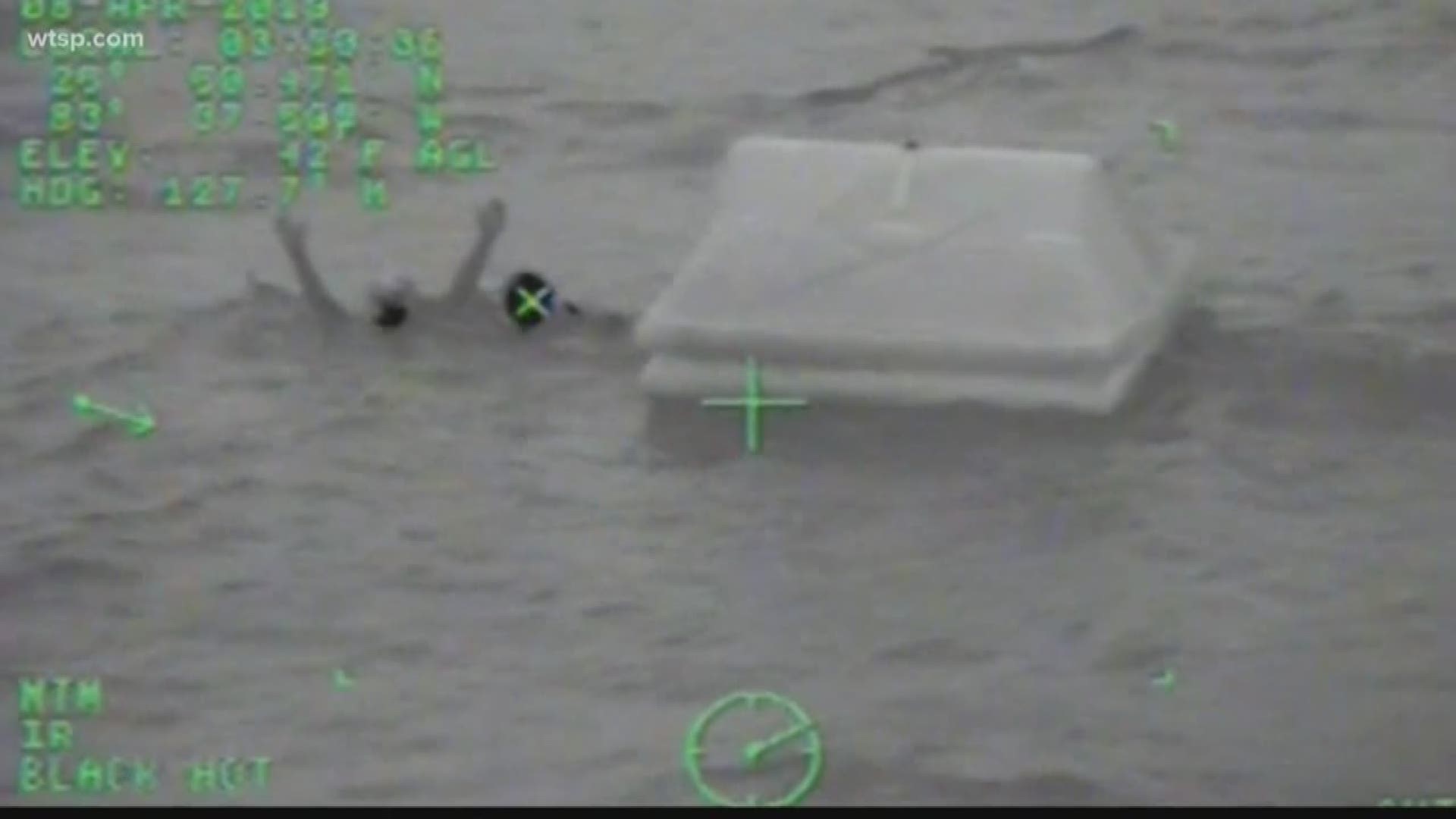 Three men were clinging to a life raft in the Gulf of Mexico for more than two hours before Coast Guard crews were able to rescue them.