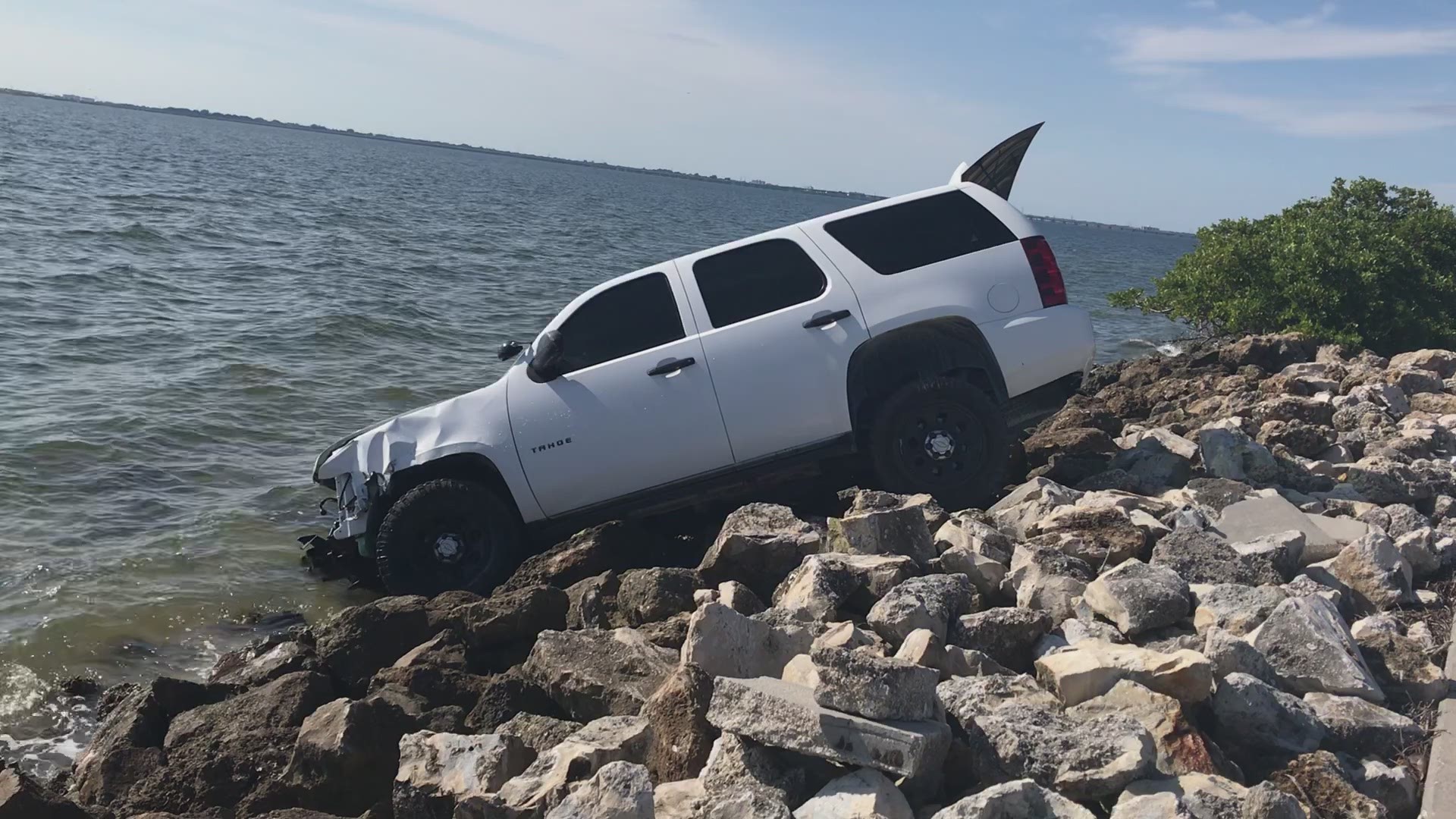 A driver lost control on the Courtney Campbell Causeway, and the SUV ended up on the rocks.