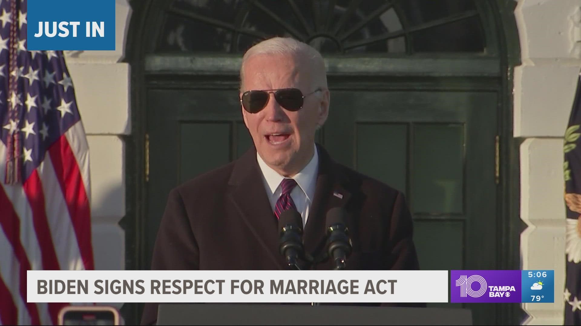 “This law and the love it defends strike a blow against hate in all its forms,” Biden said Tuesday on the South Lawn of the White House.