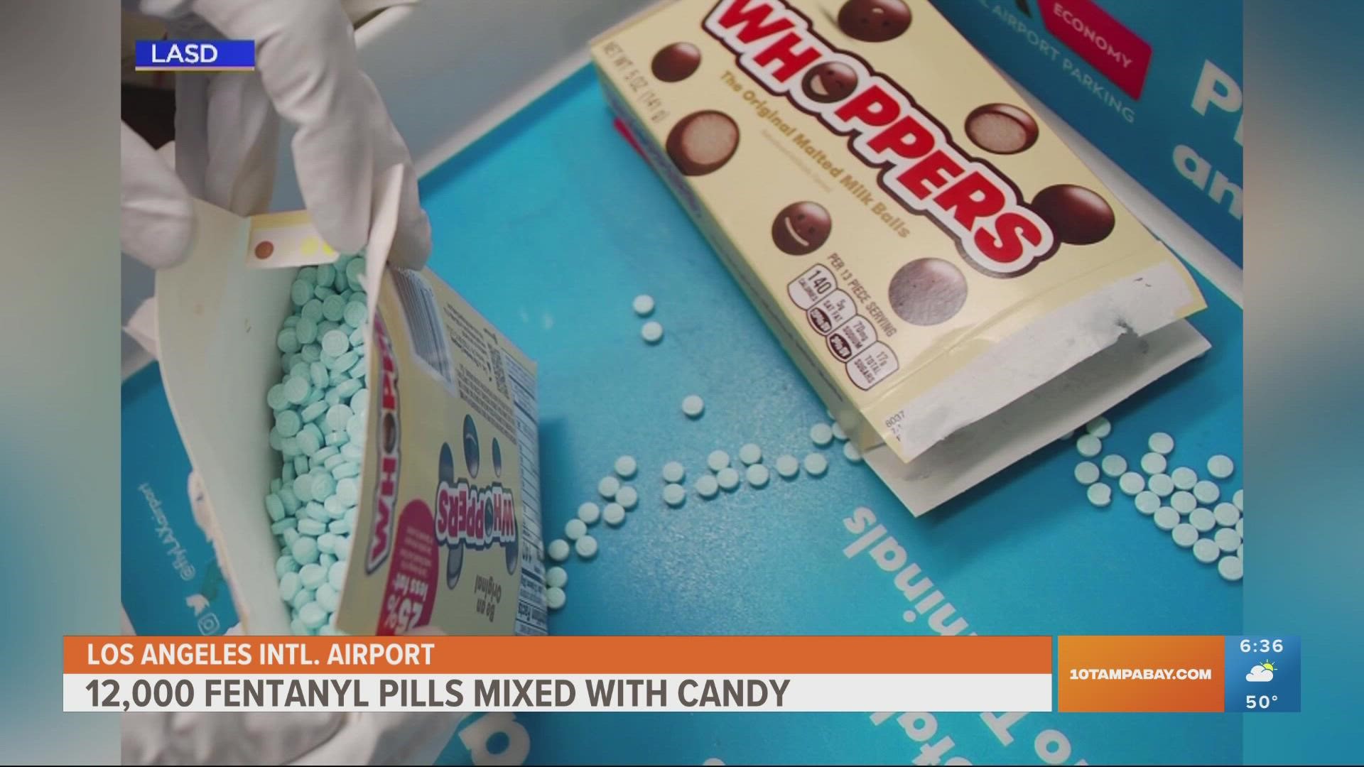 Agents seized about 12,000 pills stuffed inside packages of Sweetarts, Skittles and Whoppers.