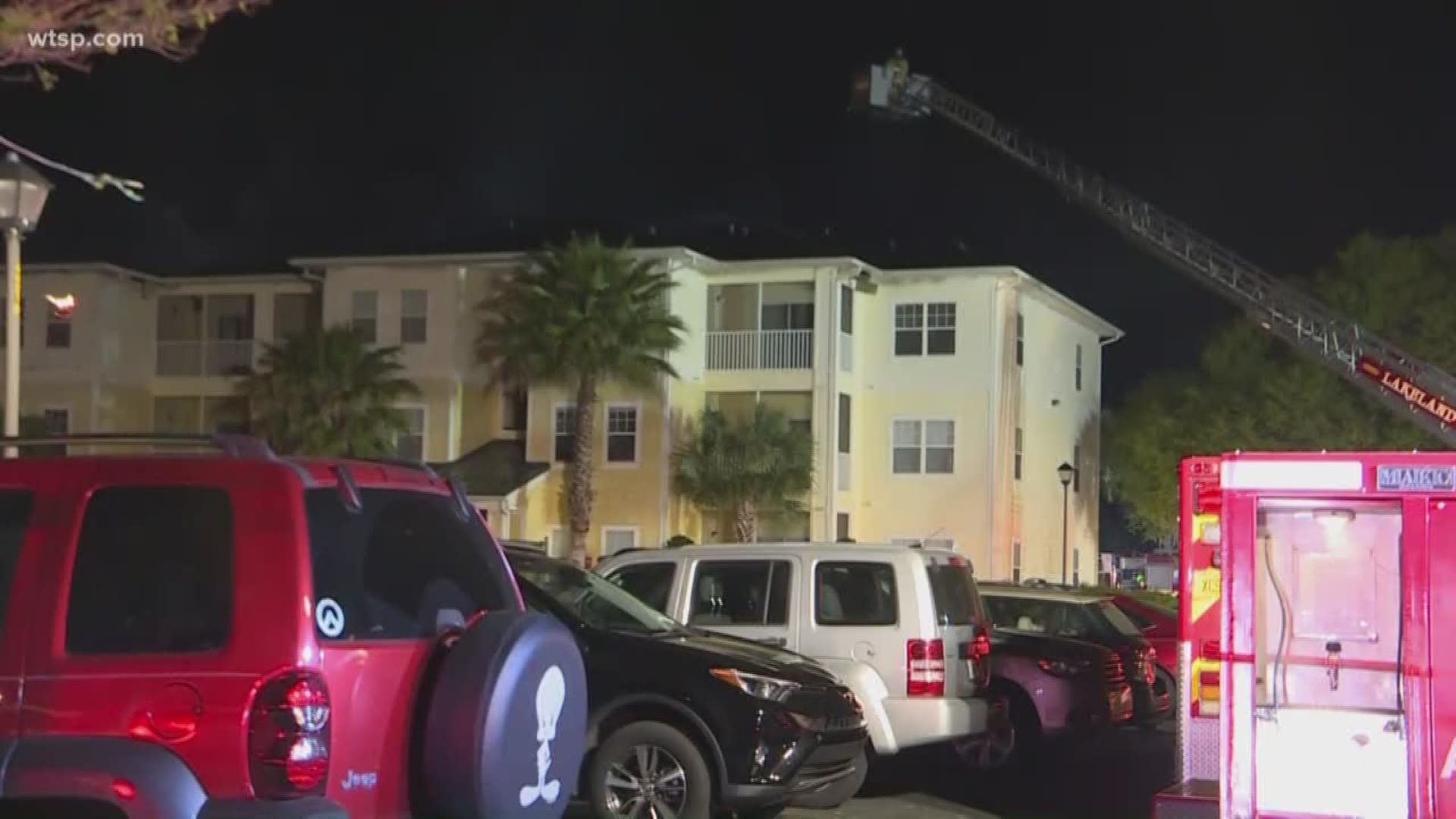 Residents at a Lakeland apartment building have been displaced as a fire burned through its roof.