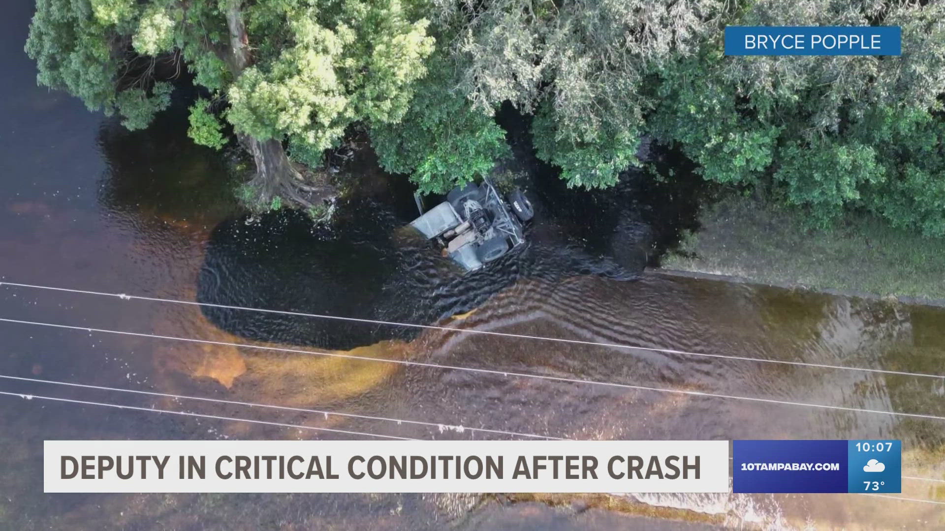 It happened in the area of Dixie Avenue as the deputy and a Dade City law enforcement official were scouting floodwaters, officials said.