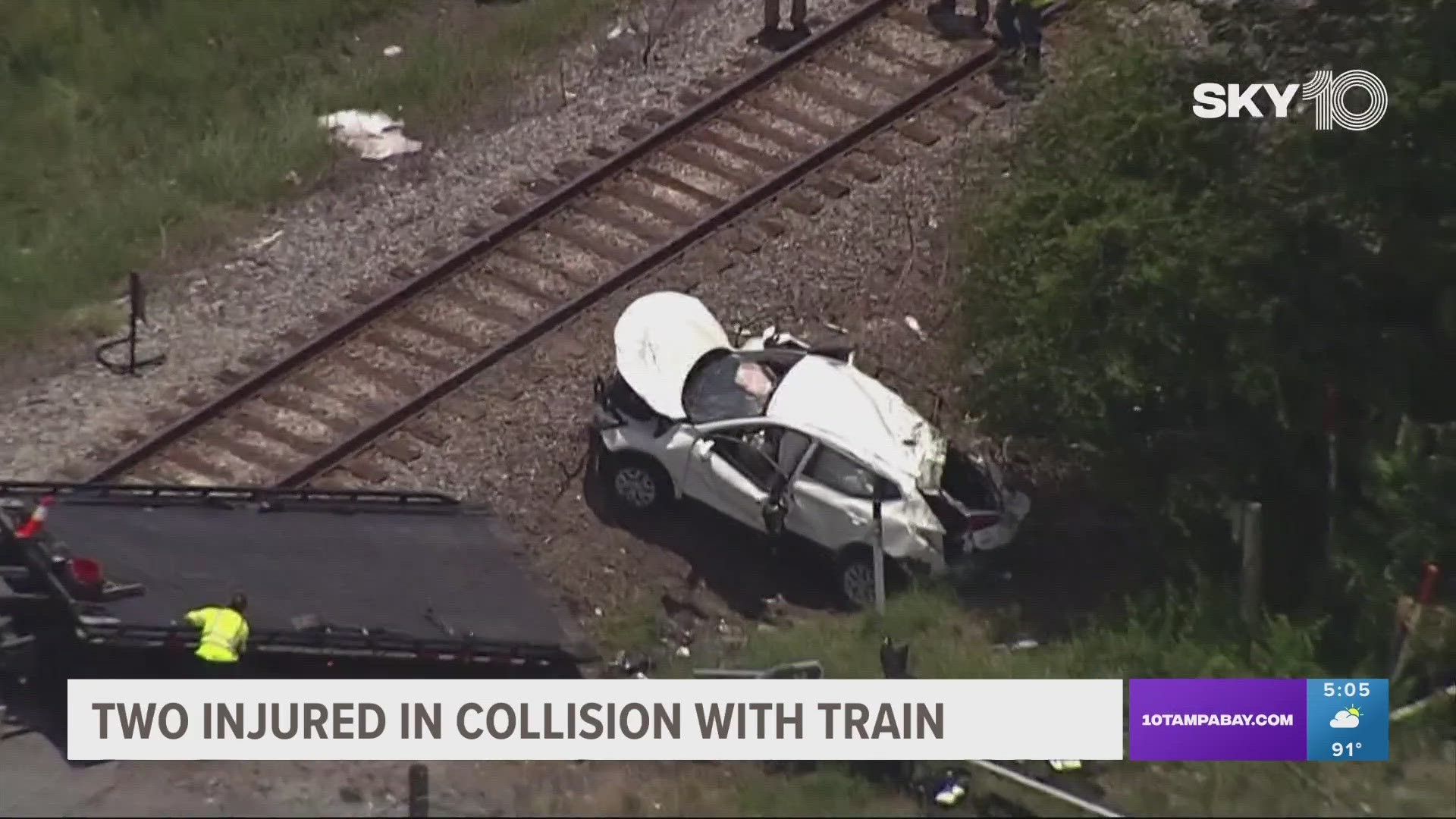The train and SUV collided at East Broadway Avenue and East Tampa Boulevard in Tampa shortly after 1 p.m., authorities said.