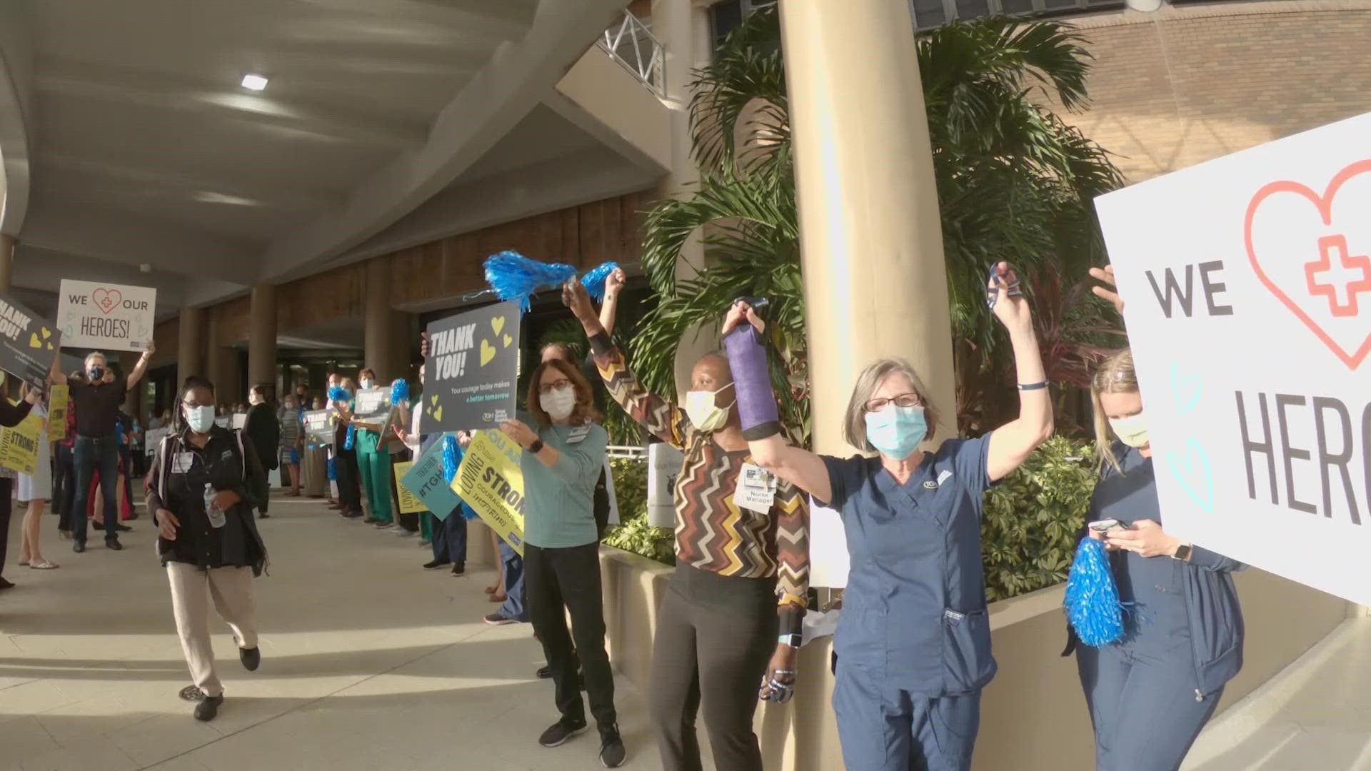 Hospital executives cheered, clapped, held signs and blasted music for the workers Thursday evening.