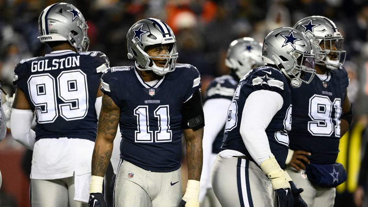Cowboys defeat 'blue jersey curse' with playoff victory over Buccanneers