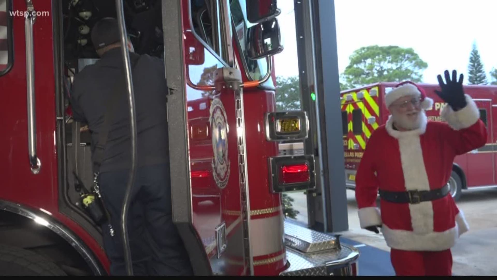 The Pinellas Park Fire Department teamed up with Santa to deliver a fire truck full of presents to nine families.