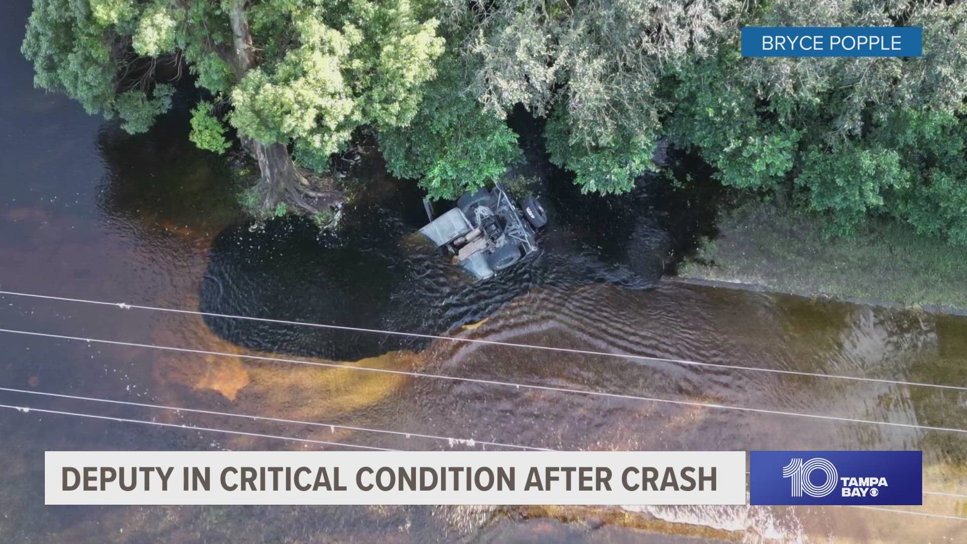 It happened in the area of Dixie Avenue as the deputy and a Dade City law enforcement official were scouting floodwaters, officials said.