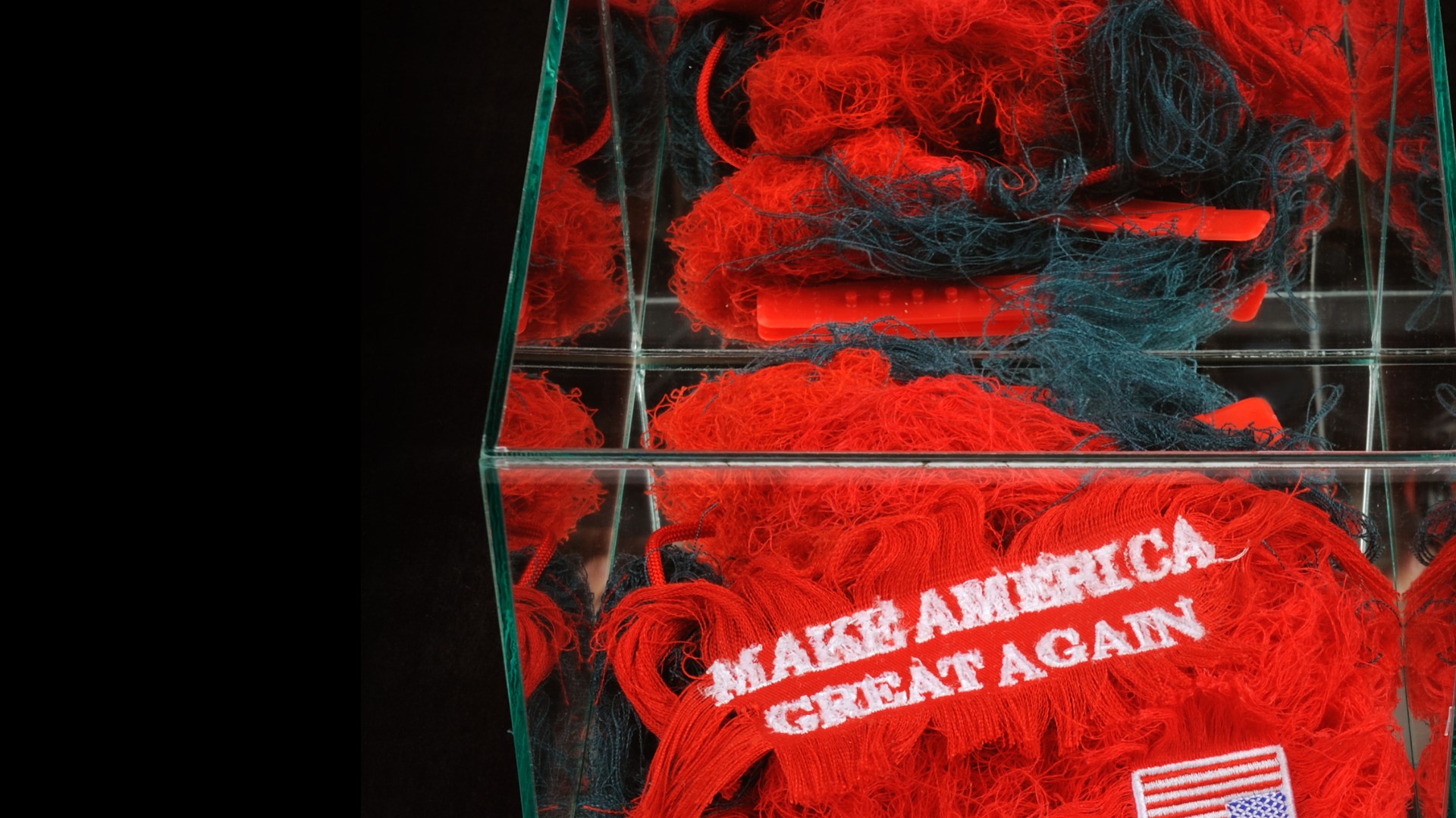 Artist Kate Kretz comments on hate speech by reconstructing MAGA hats into identifiable symbols of hate