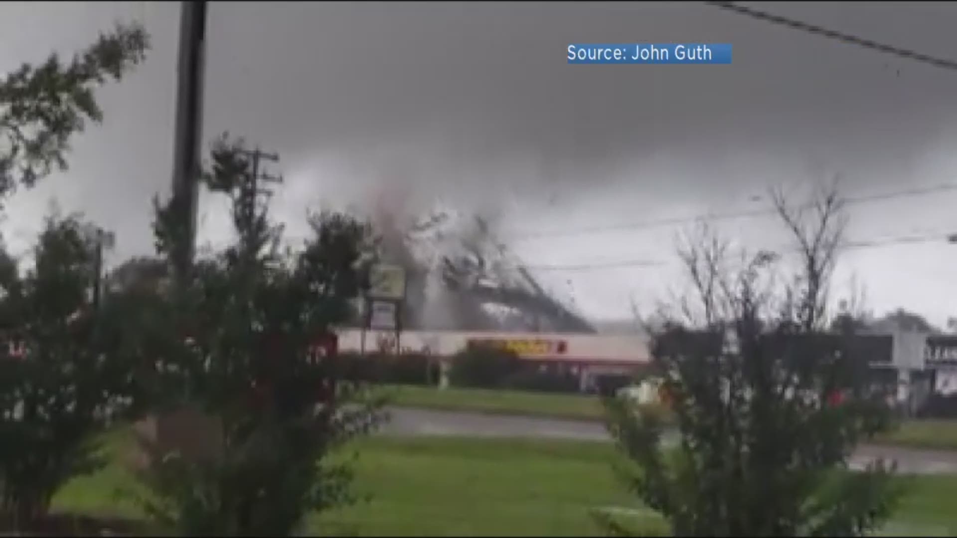 Crazy viewer video from Richmond station NBC 12 of a tornado pulling a roof off a building in Midlothian, Va. and drawing debris into the air.