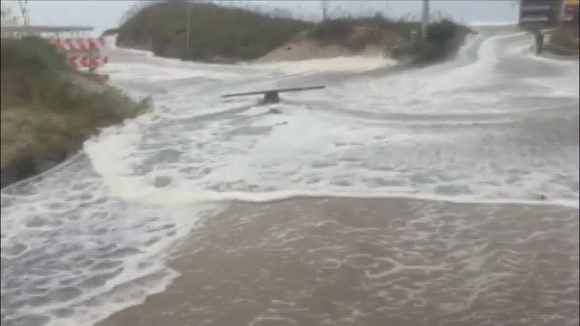 Water pours across and down Seabreeze Drive in Kinnakeet Village, N.C. (in Avon) on September 13, 2018. Video courtesy of Tim Fitch.