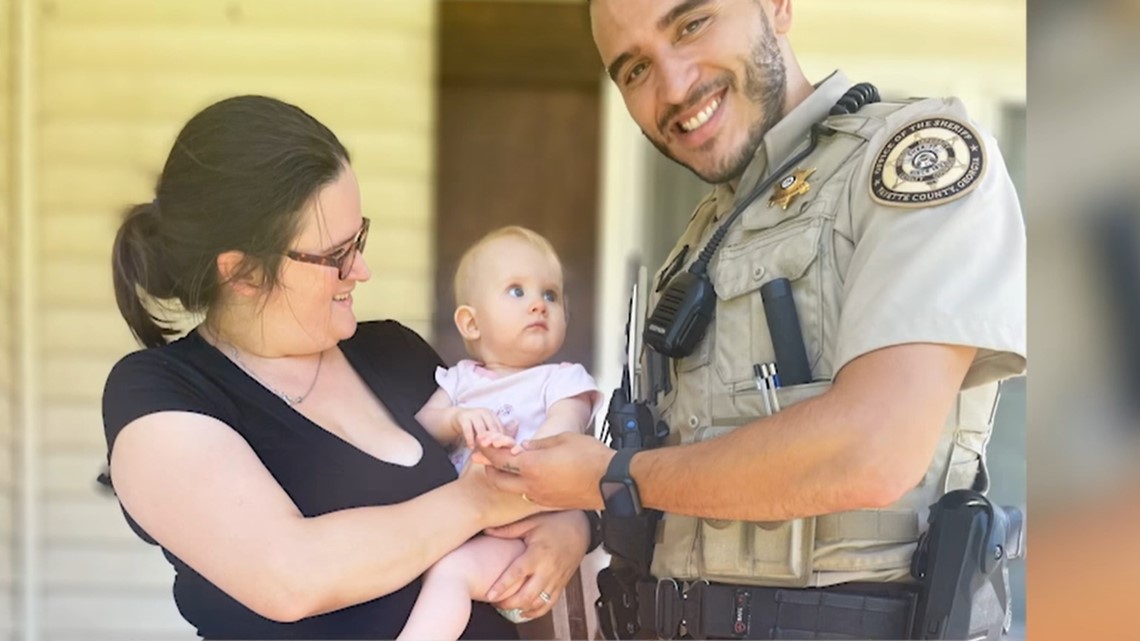 Video: Fayette County deputy helps rescue baby inside hot car | wtsp.com