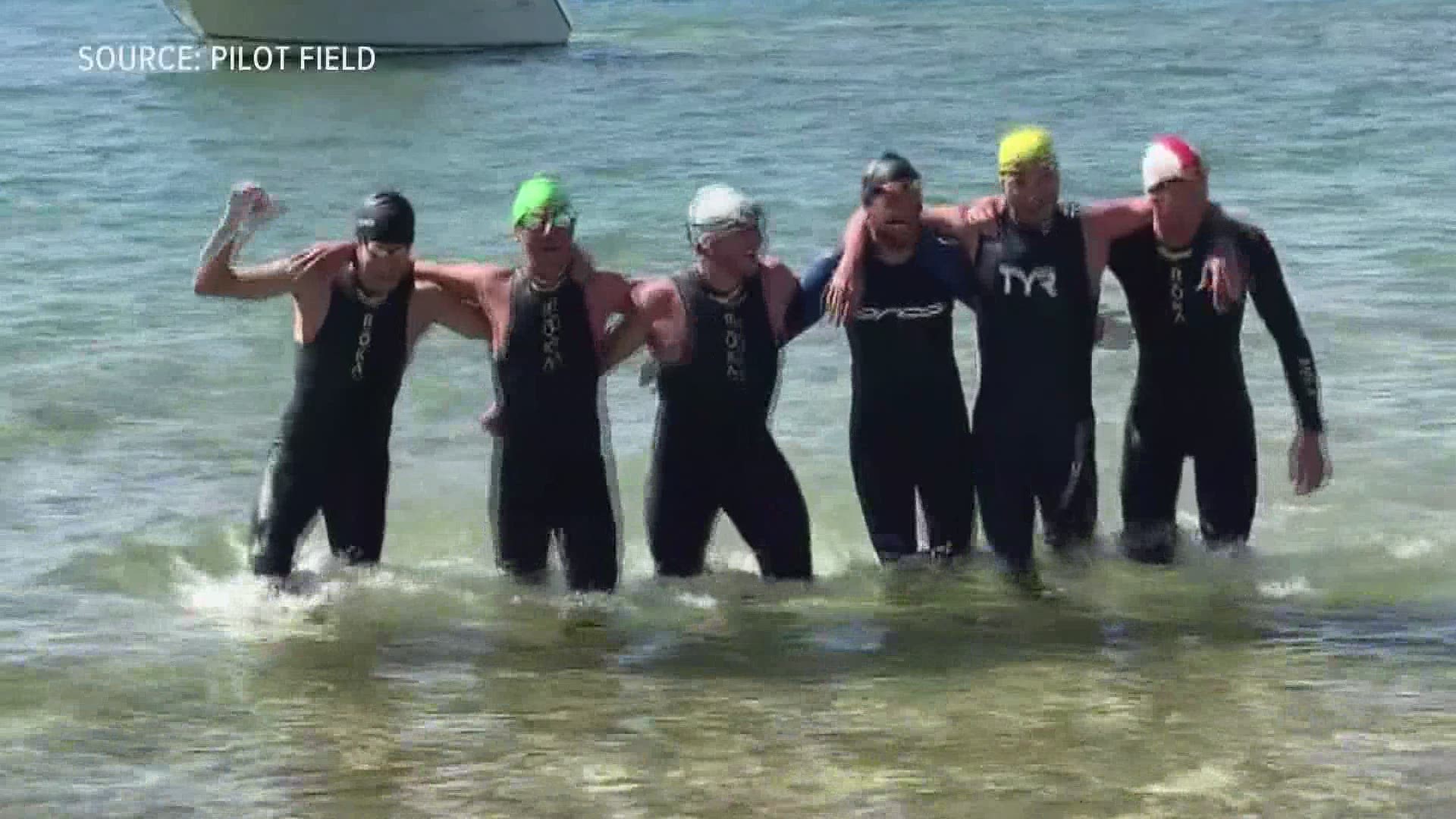 The group of six swam nearly 60 miles, from Wisconsin to Ludington in just 20 hours and 50 minutes.
